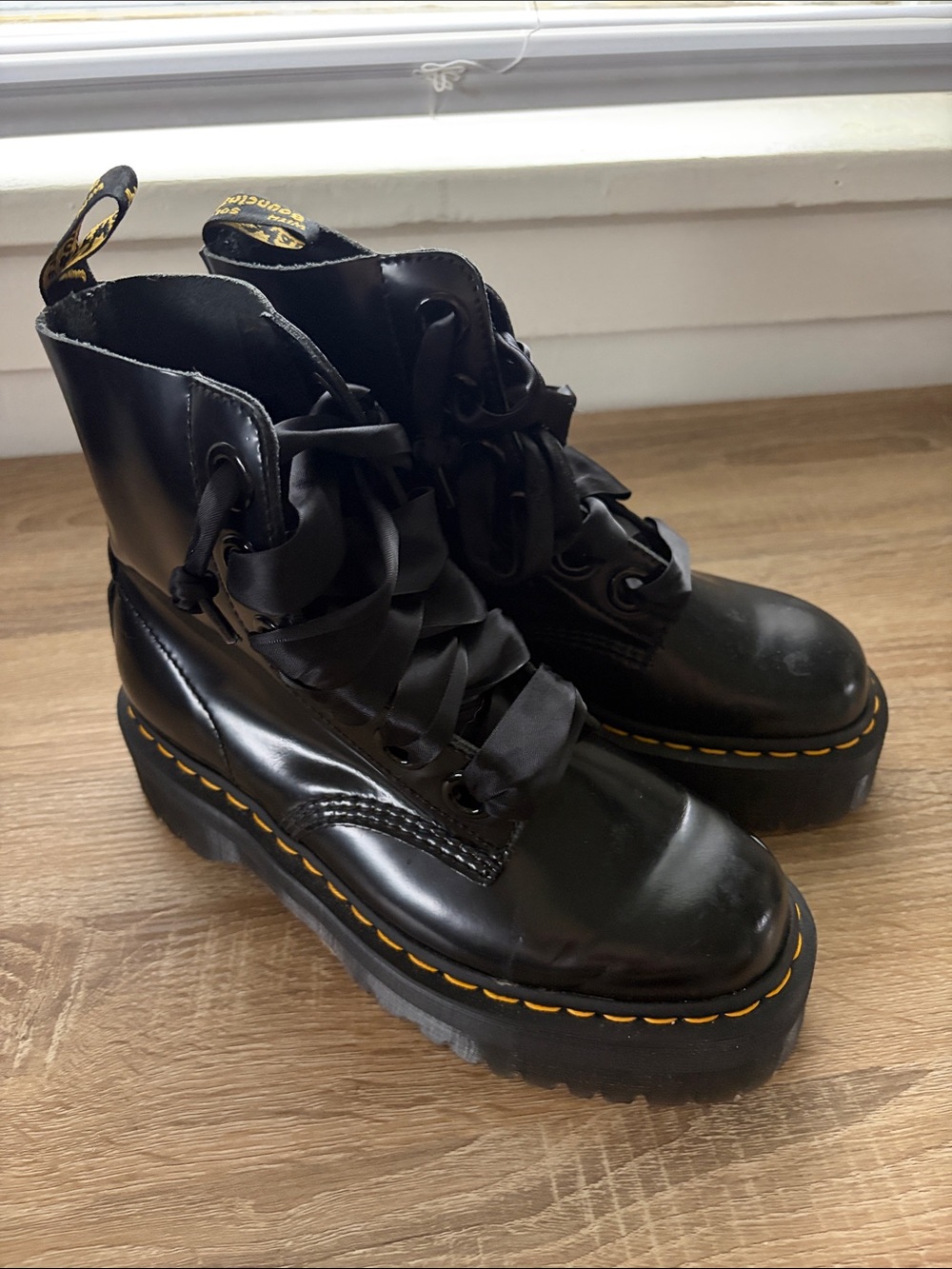 Dr. Martens Black Leather Combat Boots with Yellow Stitching